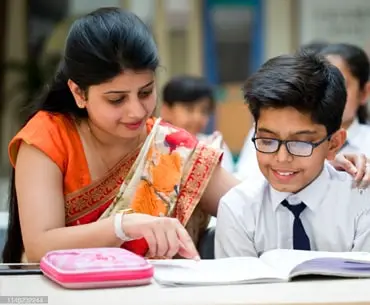 Students engaging in leadership and peer mentoring at Greater Noida World School
